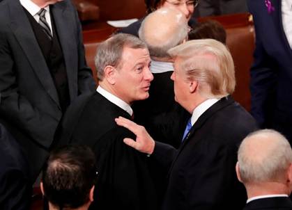 Roberts and Trump greeting